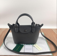 Longchamp pliage cuir d'occasion  Expédié en Belgium