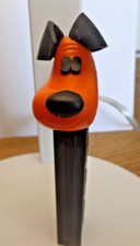 PEZ Vintage Cachorro Feliz Laranja Cabeça Orelhas Pretas Olhos Nariz Haste Preta Áustria NF comprar usado  Enviando para Brazil