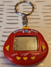 Chaveiro eletrônico virtual para animais de estimação Dinkie Dino RakuRaku Dinokun bolso vermelho comprar usado  Enviando para Brazil