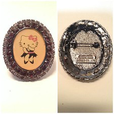 Hello kitty spilla usato  San Donato Milanese
