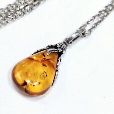 Collier goutte ambre d'occasion  Le Luc