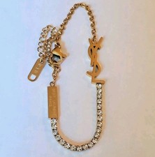 Pulseira corrente Yves Saint Laurent YSL folheada a ouro CZ comprimento ajustável comprar usado Pulseira corrente Yves Saint Laurent YSL folheada a ouro CZ comprimento ajustável comprar usado  Enviando para Brazil