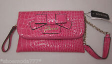 Guess lulin clutch d'occasion  Expédié en France