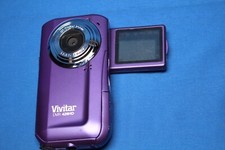 Filmadora Vivitar DVR 426HD - Tela de visualização roxa funcionando arranhada comprar usado Filmadora Vivitar DVR 426HD - Tela de visualização roxa funcionando arranhada comprar usado  Enviando para Brazil