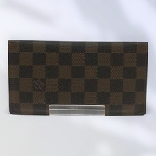 Louis vuitton porte d'occasion  Expédié en Belgium