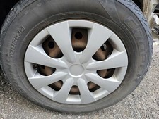 Tampa de roda usada serve: 2009 Toyota Corolla 15`` roda 8 raios grau A comprar usado  Enviando para Brazil