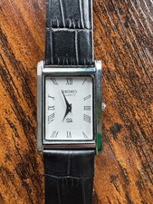 Usado, Relógio social vintage masculino Seiko quartzo tanque fino mostrador branco couro preto comprar usado  Enviando para Brazil