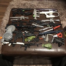 Action figure weapons for sale  EVESHAM