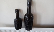 Two dark glass for sale  ILKESTON