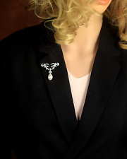 Broche argenté nœud d'occasion  Paris VI