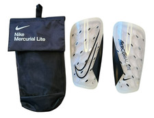 Caneleiras Nike Mercurial Lite -4'11"/5'3" comprar usado  Enviando para Brazil