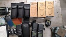 Pacote com três flashes e transmissores/receptores Yongnuo comprar usado  Enviando para Brazil