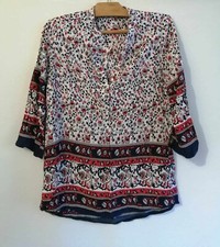 Blouse bleue fleurs d'occasion  Bourg-de-Thizy