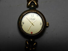 Montre quartz dorée d'occasion  Brie
