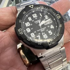 Casio😱Mostrador preto moldura giratória 3 mãos analógico MRW-200H 5125 quartzo 🙏Relógio masculino comprar usado  Enviando para Brazil