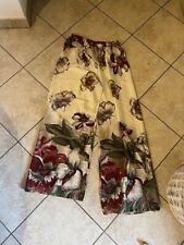 Pantaloni bianchi fiorati usato  Chivasso