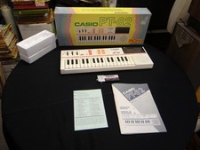 Mini sintetizador de teclado eletrônico Casio PT-82 vintage dos anos 1980 com manuais e rom comprar usado  Enviando para Brazil