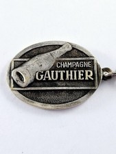 Porte cles champagne d'occasion  L'Absie