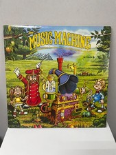 Vinyl THE MUSIC MACHINE by CANDLE 1977 Original gate-fold vinyl LP w/storybook, usado comprar usado Vinyl THE MUSIC MACHINE by CANDLE 1977 Original gate-fold vinyl LP w/storybook, usado comprar usado  Enviando para Brazil