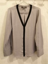 Blouse grise polyester d'occasion  Bourg-de-Thizy