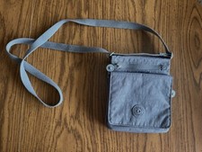 Bolsa tiracolo feminina Kipling Eldoraro pequena cinza pomba com chaveiro macaco comprar usado  Enviando para Brazil