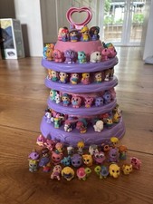 122 squinkies stand for sale  WARE