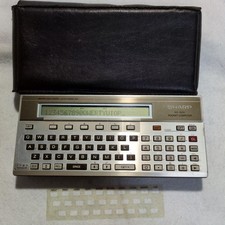 Computadora de bolsillo SHARP PC-1500 vintage con teclado QWERTY y estuche probada funcionando segunda mano  Embacar hacia Mexico