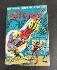 Album strange reliure d'occasion  Arcueil