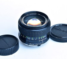 Objectif minolta rokkor d'occasion  Paris IV