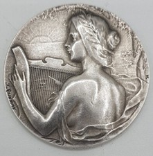 Médaille femme harpe d'occasion  Cuxac-d'Aude