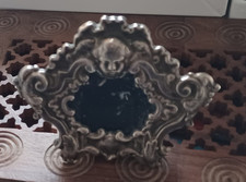 Cornice argento sbalzato usato  Roma