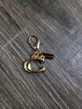 Bolsa Coach Signature C mini dourada charme zíper puxar autêntica  comprar usado  Enviando para Brazil