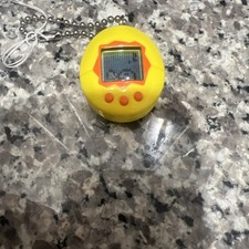 Bandai Original TamaGotchi Amarelo e Laranja, 1996 - 1997 Inglês comprar usado Bandai Original TamaGotchi Amarelo e Laranja, 1996 - 1997 Inglês comprar usado  Enviando para Brazil