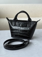 Longchamp pliage cuir d'occasion  Expédié en Belgium