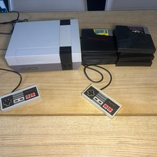 Nintendo NES – Bon état – 9 jeux inclus – 2 manettes – Testée – Câbles d’origine comprar usado  Enviando para Brazil
