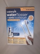 Cepillo de dientes sónico Waterpik WP-861 completo para cuidado bucal hilo dental segunda mano  Embacar hacia Mexico