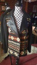 Veste matière cuir d'occasion  Paris XIX