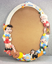 Moldura espelhada oval de plástico vintage Pinóquio Walt Disney década de 1960 comprar usado Moldura espelhada oval de plástico vintage Pinóquio Walt Disney década de 1960 comprar usado  Enviando para Brazil