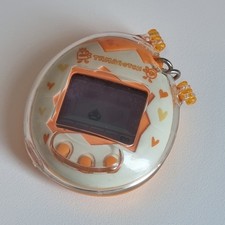 Tamagotchi Mesutchi 1997 Bandai com Estojo Original Laranja JAPONÊS Funcionando comprar usado Tamagotchi Mesutchi 1997 Bandai com Estojo Original Laranja JAPONÊS Funcionando comprar usado  Enviando para Brazil