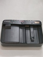 Carregador de bateria Canon série 1 D para bateria LP E4 N, usado, testado funcionando OK comprar usado Carregador de bateria Canon série 1 D para bateria LP E4 N, usado, testado funcionando OK comprar usado  Enviando para Brazil