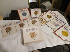 GRAN Colección de 92 MUNDIAL SIN CIRCULAR. Monedas en páginas con carpeta y libros originales segunda mano  Embacar hacia Mexico