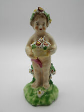 Figurine enfant fleurs d'occasion  Saint-Calais