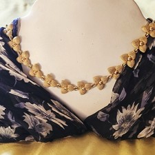 Collier vintage doré d'occasion  Le Luc