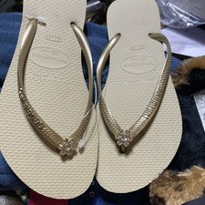 Sandálias flip flops Havaianas ouro claro tamanho 6 flores de cristal comprar usado  Enviando para Brazil