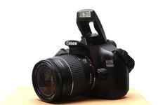 Canon EOS 1100D 12,2 MP FULL HD DSLR z obiektywem Canon EF 28-80mm II i dodatkiem, używany na sprzedaż  Wysyłka do Poland