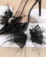 Black feathered bows for sale Black feathered bows for sale  HARTLEPOOL