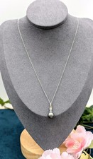Collier blanc orné d'occasion  Les Mureaux