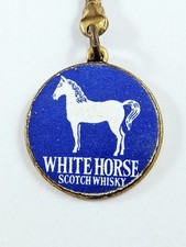 Porte cles white d'occasion Porte cles white d'occasion  L'Absie