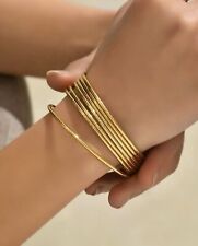 Bracelet femme doré d'occasion  Artix