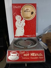 Boneco de neve vintage Hot Nestlé anúncio mágico redemoinho máquina de chocolate quente comprar usado  Enviando para Brazil